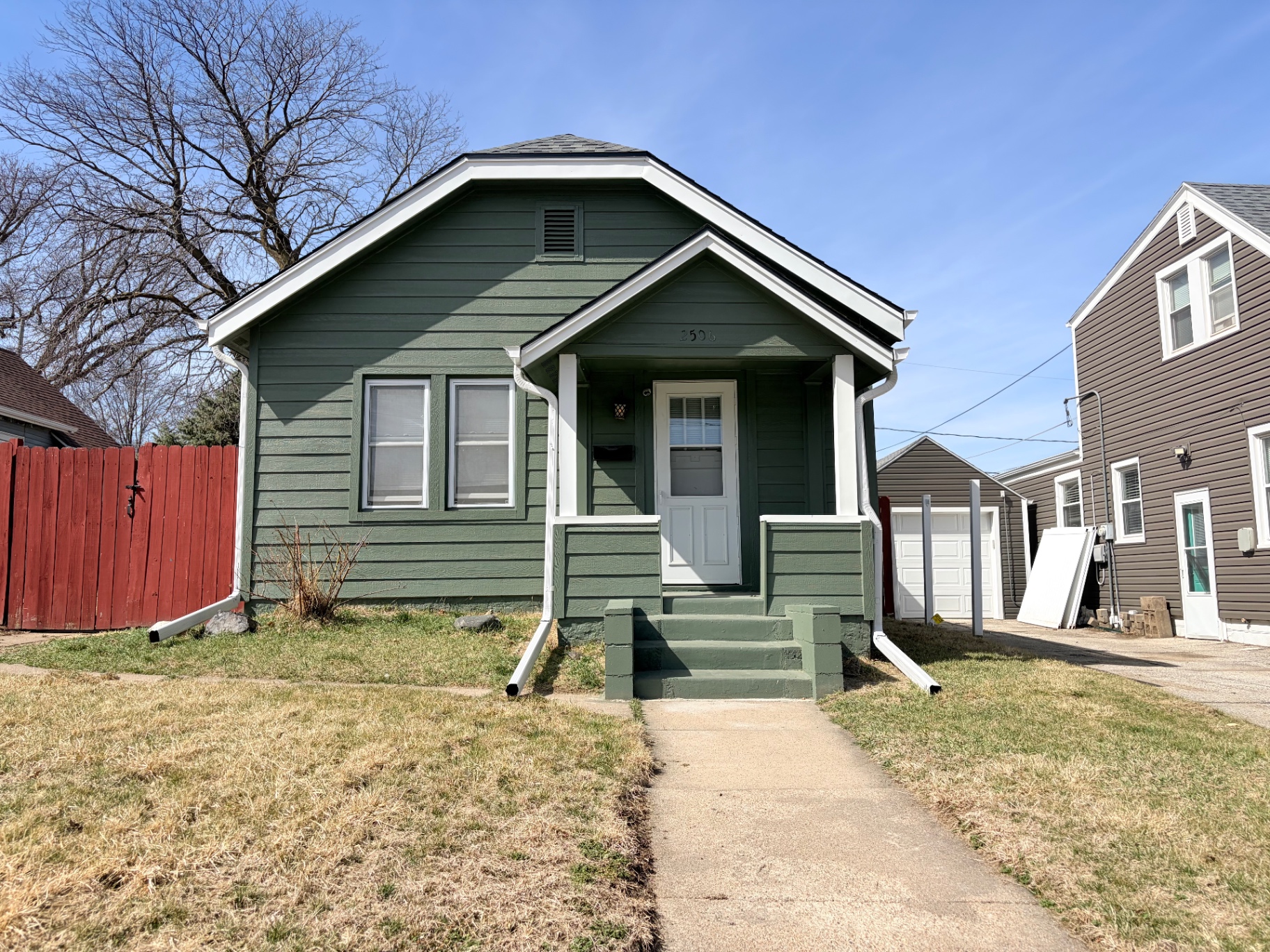 New siding, trim & gutters — After
